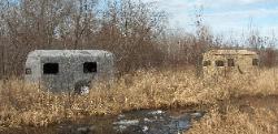 Superflauge and Cowboy Camo Trailers set up fo hunting.